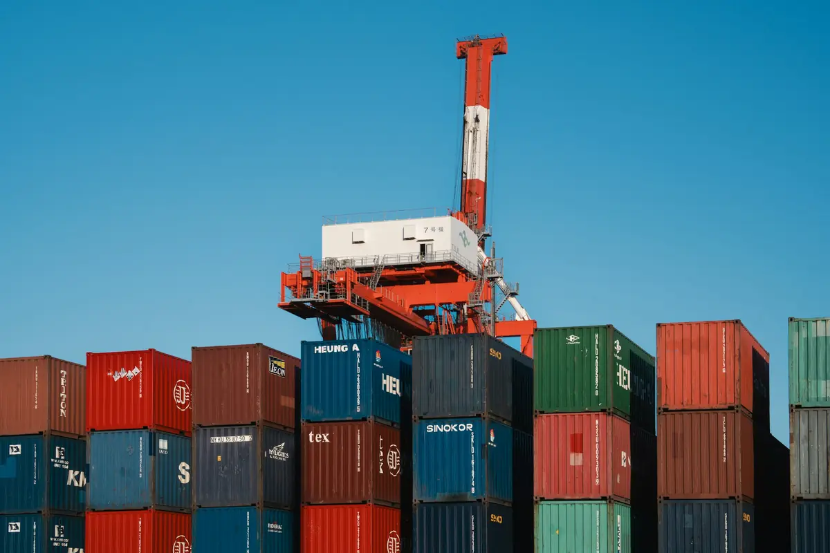 Gantry crane loading containers at a port
